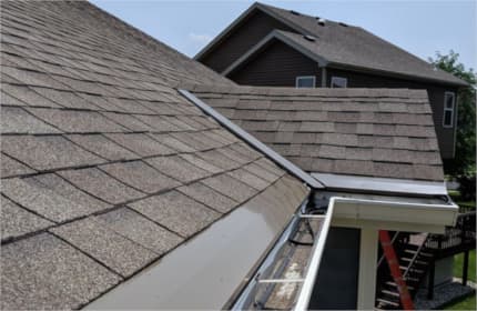 Medium bronze valley and eave panels match roof color