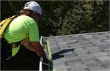 Installing a heated gutter and heated downspout in an ice dam prevention system in Wisconsin